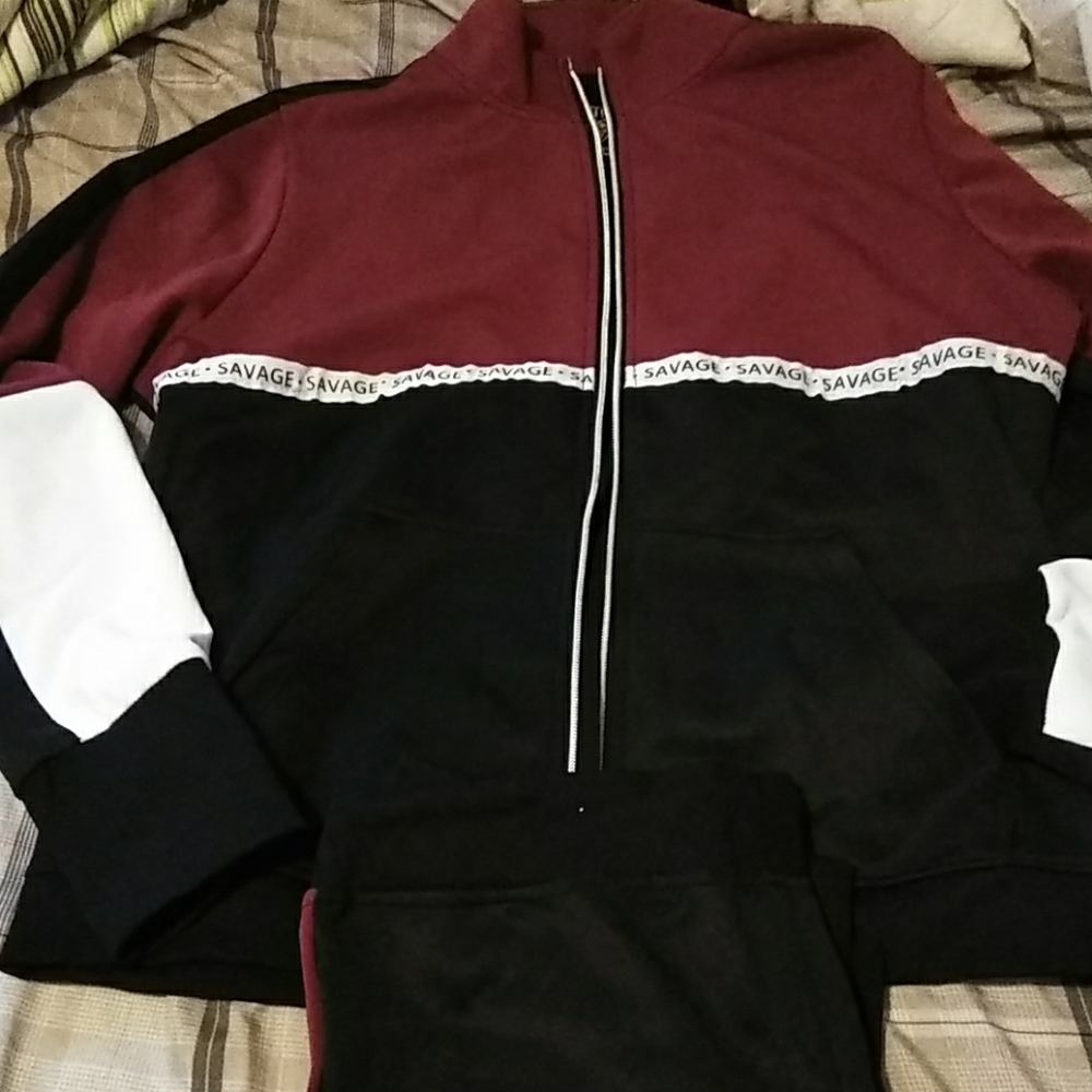 Black, silver, burgundy and white jump suit